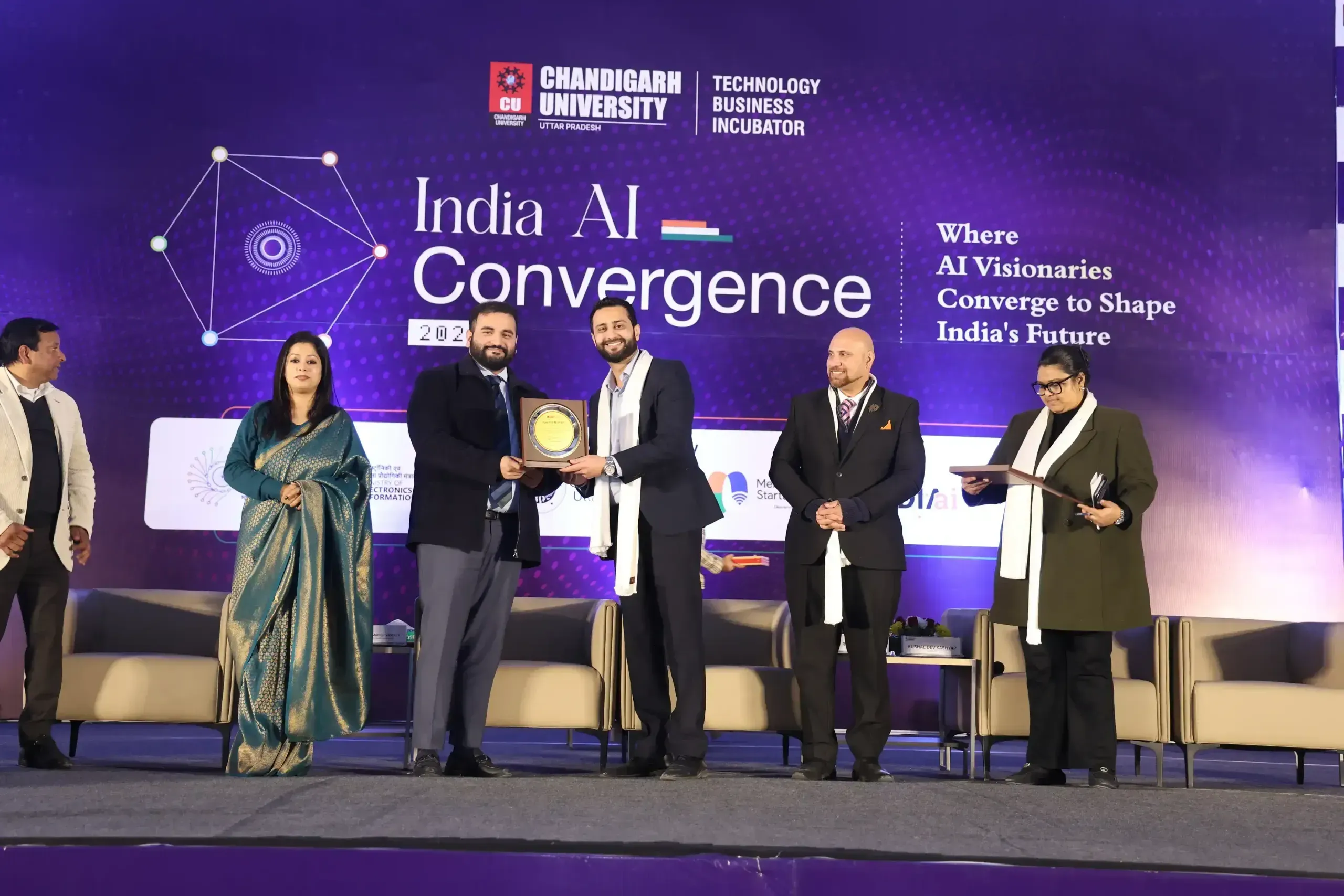Speakers on stage at India AI Convergence