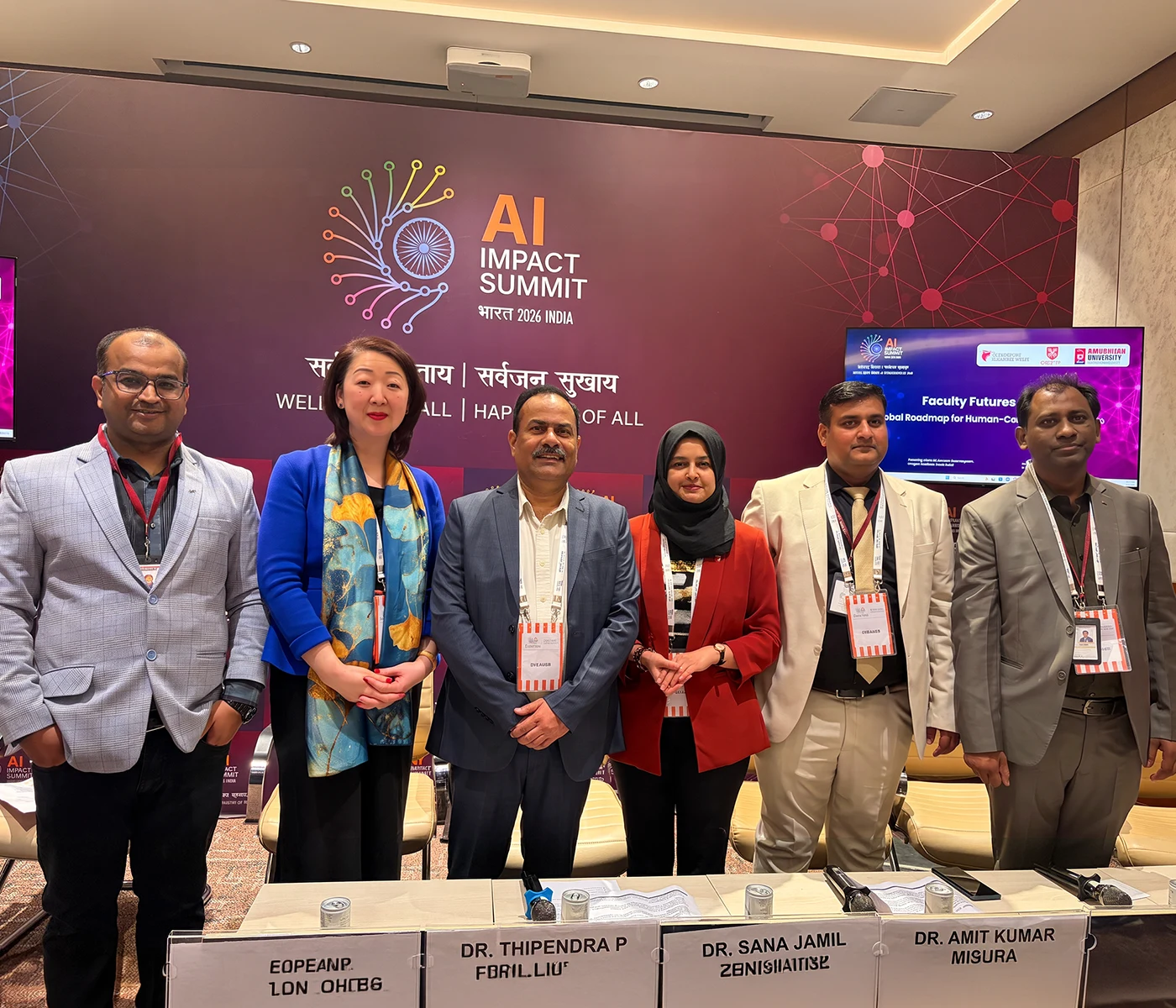Panellists at the AI Impact Summit 2026, Bharat, before the summit’s Welfare for All, Happiness of All backdrop